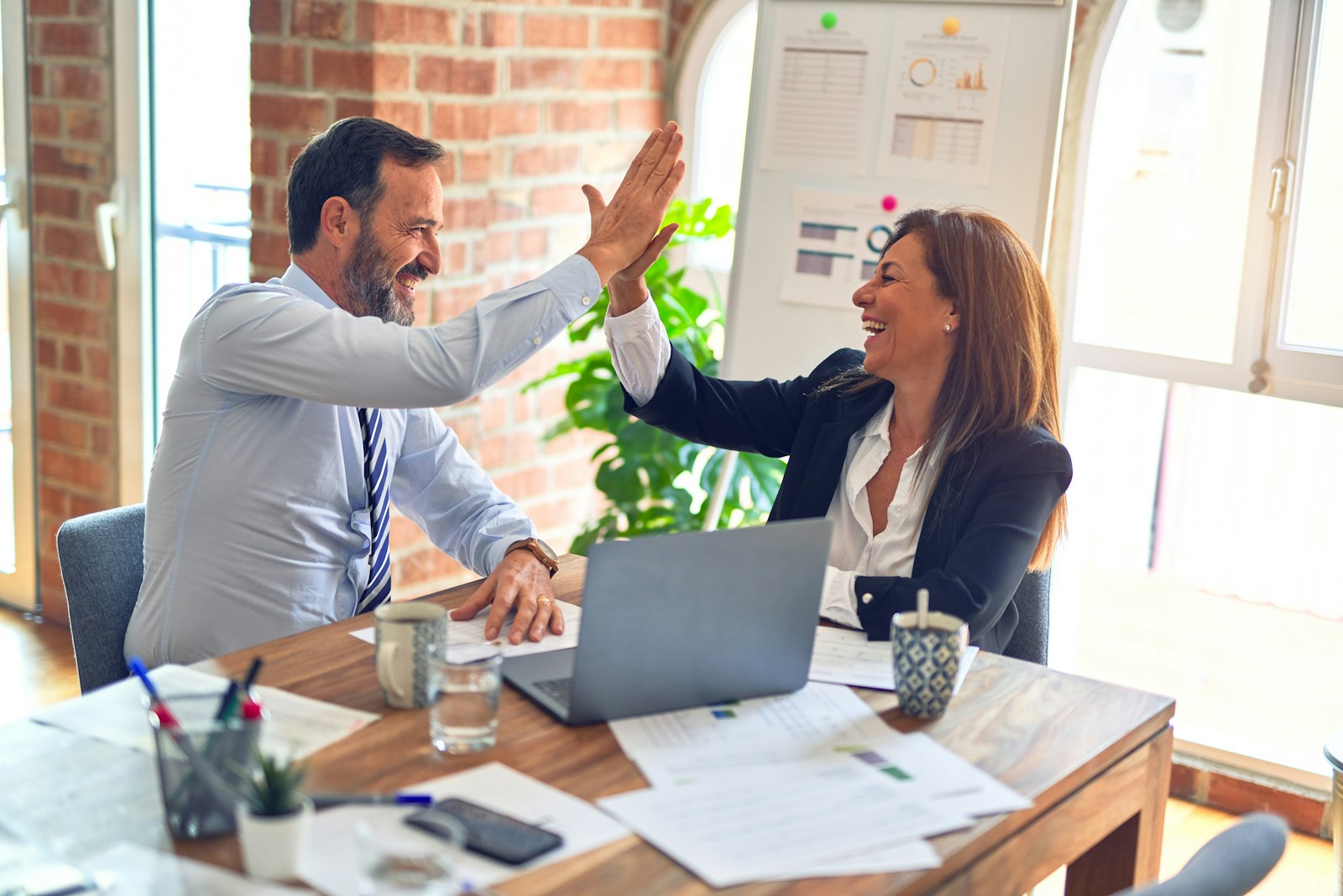 Zaxis Health revenue cycle team collaborating on client accounts